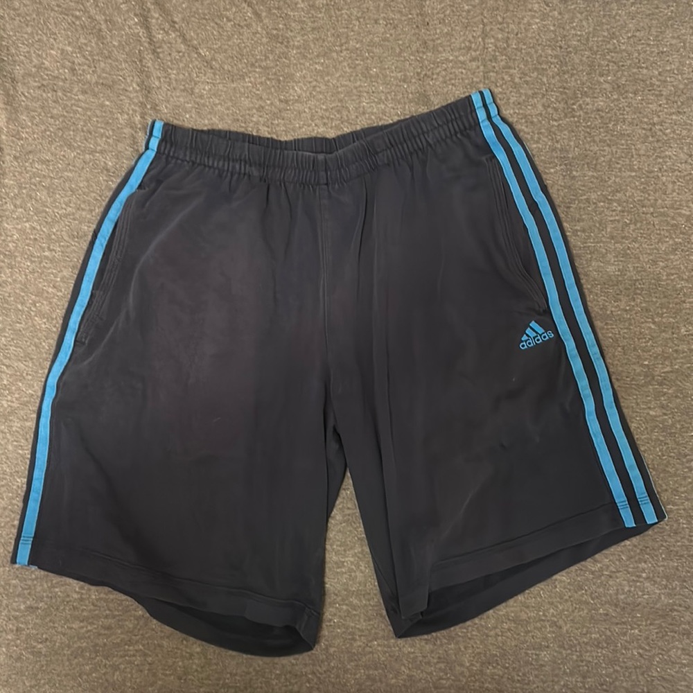 Medium size adidas shorts. Cotton and knee height